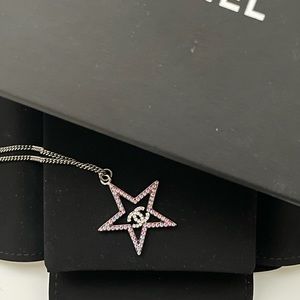 Iridescent Chanel Star necklace